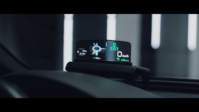 Video Reference: Vehicle, Car, Automotive design, Logo, Hybrid vehicle, Multimedia, Indoor, Sitting, Screen, Computer, Monitor, Television, Laptop, Looking, Table, Dark, View, Desk, Man, Phone, Holding, Black, Keyboard, Woman, Remote, Video, Room, Screenshot, Text, Auto part