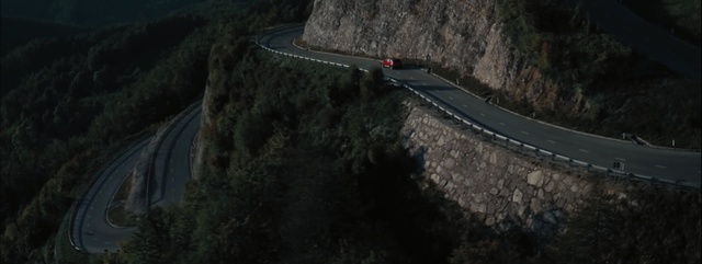 Video Reference: mountain pass, ridge, geological phenomenon, road, terrain, mountain, extreme sport, aerial photography, screenshot, mountain range