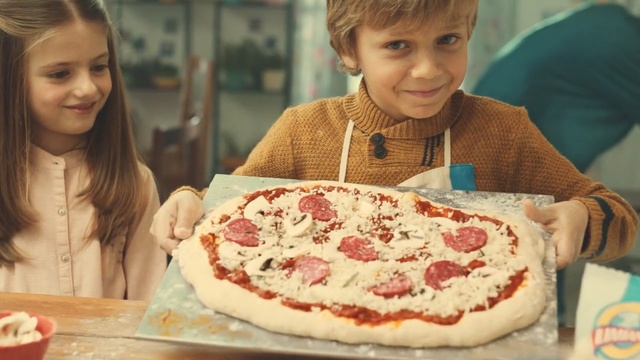 Video Reference: pizza, cuisine, dish, food, baking, torte, eating, baked goods, italian food, Person