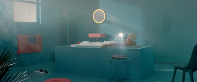 Video Reference: Room, Turquoise, Furniture, Interior design, Table, Person