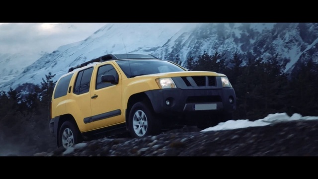 Video Reference: Land vehicle, Vehicle, Car, Automotive tire, Automotive design, Motor vehicle, Sport utility vehicle, Natural environment, Yellow, Nissan xterra