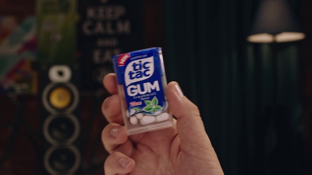 Video Reference: Finger, Hand, Food, Snack, Dairy, Person, Indoor, Holding, Front, Small, Young, Using, Man, Little, Boy, Table, Woman, Phone, Text