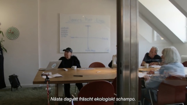 Video Reference: Room, Office, Table, Job, Building, Interior design, Conference hall, Person