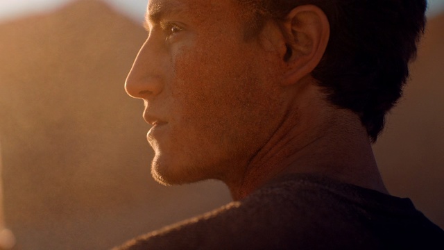 Video Reference: Face, Chin, Nose, Cheek, Neck, Head, Forehead, Skin, Close-up, Portrait, Person, Indoor, Man, Looking, Front, Holding, Glasses, Standing, Staring, Hand, Room, Video, Laptop, Remote, Living, Mirror, Dark, Using, Glass, Woman, Shirt, Red, Close, Young, Screen, Wearing, Television, Computer, Control, Playing, Hat, Game, Cat, Blurry, Phone, Human face