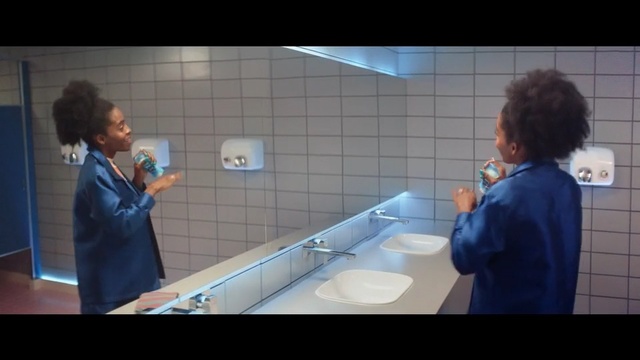 Video Reference: blue, room, snapshot, fun, mouth, conversation, organ, screenshot, girl, public toilet, Person