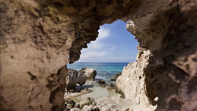 Video Reference: rock, coastal and oceanic landforms, sky, sea, formation, terrain, coast, cliff, natural arch, geology