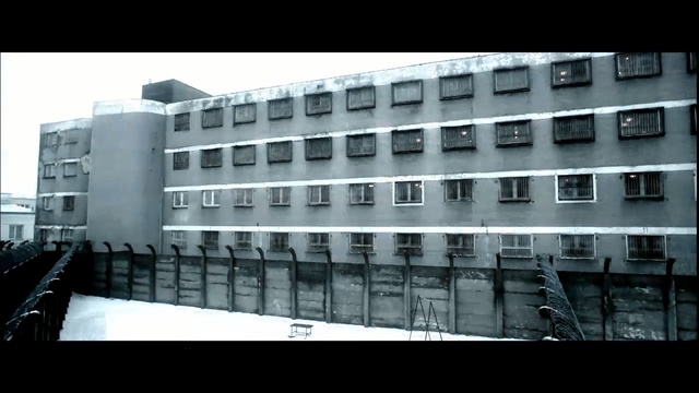 Video Reference: Architecture, Building, Black-and-white, Commercial building, Urban area, Facade, Brutalist architecture, Mixed-use, Monochrome photography, Monochrome, Person