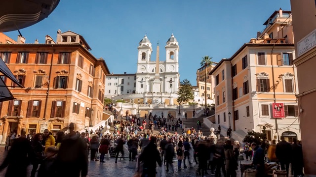 Video Reference: People, Town square, City, Town, Public space, Human settlement, Landmark, Tourism, Crowd, Plaza, Person