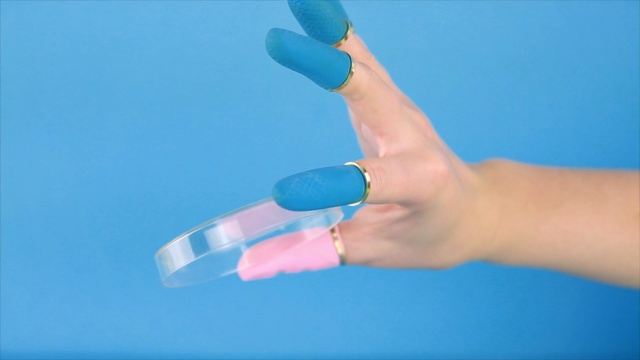 Video Reference: blue, finger, hand, azure, product, nail, thumb, sky, Person