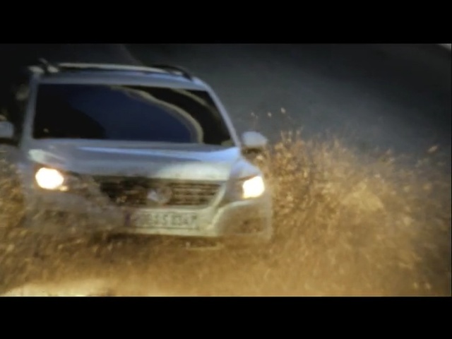 Video Reference: car, land vehicle, vehicle, motor vehicle, off roading, vehicle registration plate, mode of transport, bumper, automotive design, luxury vehicle