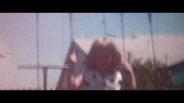 Video Reference: mammal, mode of transport, snapshot, girl, mouth, screenshot, human, arm, scene, fun
