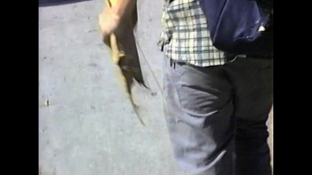 Video Reference: clothing, black, man, mammal, jeans, footwear, mode of transport, suit, male, jacket, Person