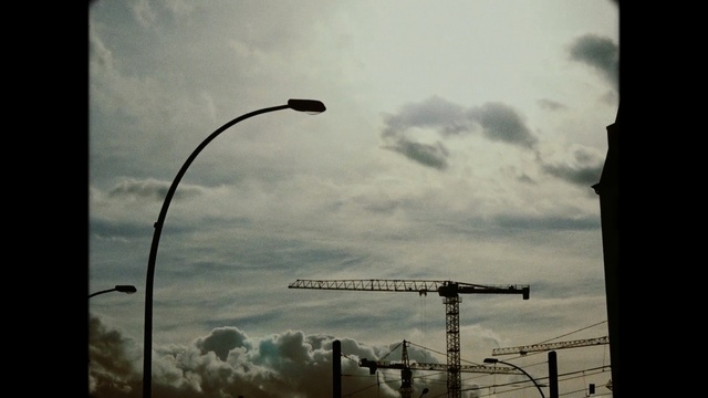 Video Reference: sky, cloud, street light, atmosphere, meteorological phenomenon, light fixture, energy, public utility, wind