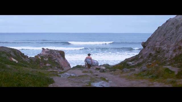 Video Reference: Coast, Photograph, Sea, Ocean, Headland, Coastal and oceanic landforms, Shore, Wave, Cliff, Sky, Person