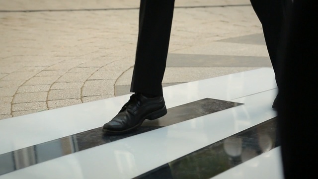 Video Reference: footwear, shoe, floor, flooring, angle