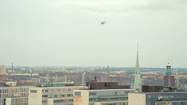 Video Reference: Urban area, Sky, Metropolitan area, City, Atmospheric phenomenon, Daytime, Human settlement, Cityscape, Metropolis, Skyline