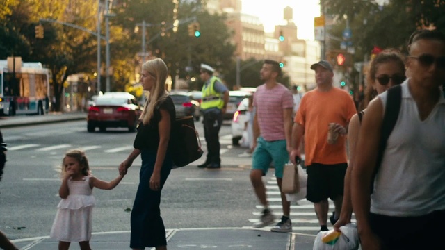 Video Reference: People, Pedestrian, Street, Crowd, Snapshot, Urban area, Walking, Fun, Interaction, Road