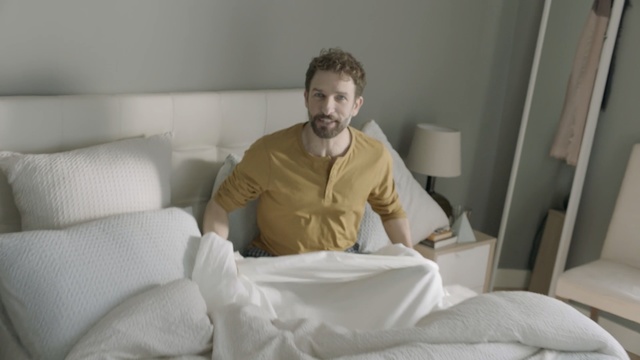 Video Reference: Comfort, Bed sheet, Bedding, Bed, Room, Linens, Sitting, Textile, Furniture, Pillow, Person