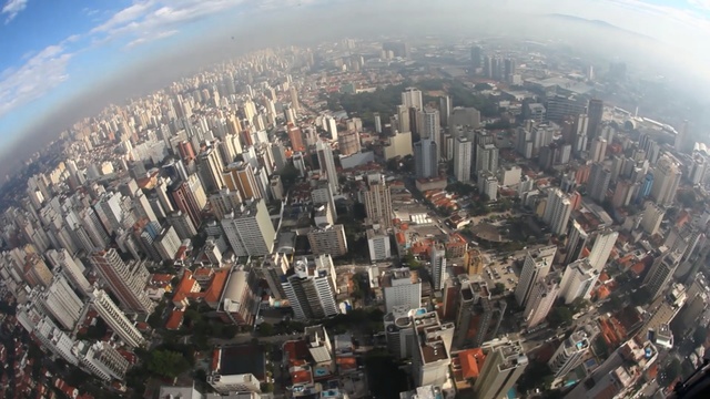 Video Reference: metropolitan area, urban area, city, aerial photography, metropolis, bird's eye view, cityscape, landmark, sky, photography, Person