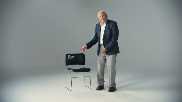 Video Reference: Standing, Sitting, Furniture, Design, Public speaking, Suit, Businessperson, Chair, Gentleman, Orator