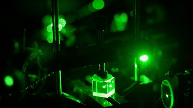 Video Reference: green, entertainment, light, darkness, laser, technology, lighting, event, rock concert, night, Person