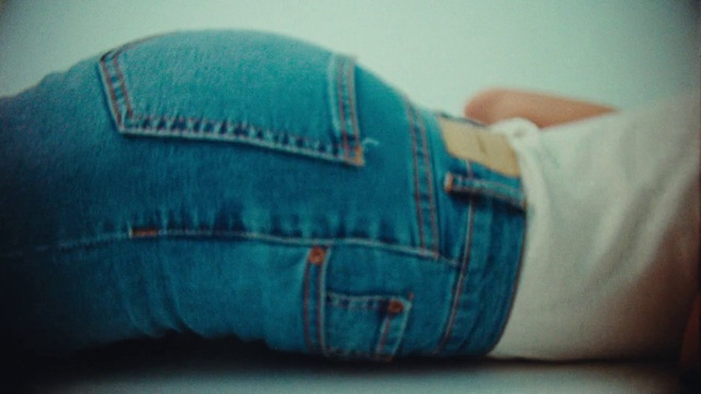 Video Reference: Jeans, Leg, Human body, Waist, Thigh, Denim, Elbow, Font, Knee, Trunk