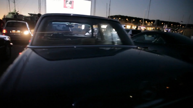 Video Reference: car, motor vehicle, mode of transport, vehicle, automotive exterior, automotive design, glass, windshield, city car, reflection