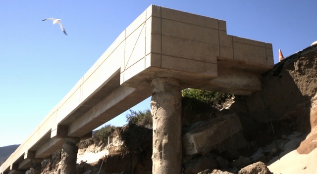 Video Reference: Architecture, Wall, Concrete bridge, Archaeological site, Ruins, Reinforced concrete, Historic site, Building, Rock, Monument, Outdoor, Mountain, Standing, Man, Food, Side, Large, Old, Rocky, Woman, Train, Enclosure, Bridge, Eating, Hill, Street, Snow, Sheep, Dirt, People, Group, City, Zoo, Sky, Tree