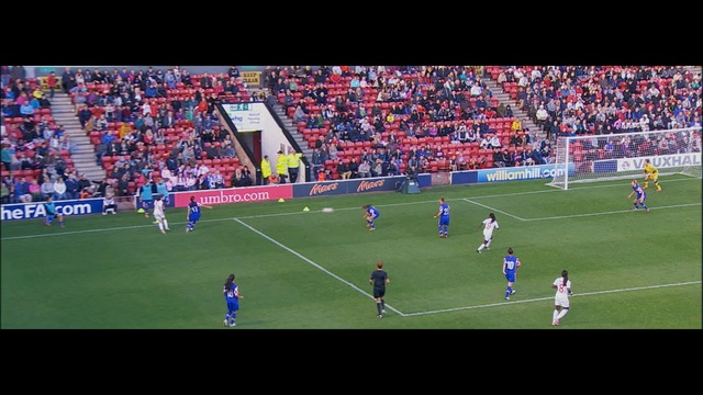 Video Reference: sport venue, player, soccer specific stadium, football player, stadium, soccer player, arena, grass, atmosphere, goal