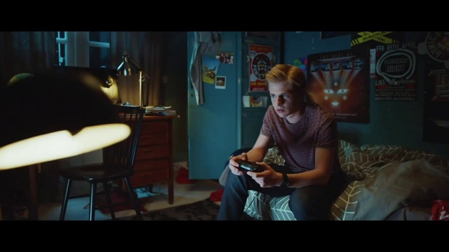 Video Reference: Snapshot, Human, Sitting, Fun, Screenshot, Movie, Mouth, Adaptation, Photography, Conversation, Person, Indoor, Looking, Young, Front, Woman, Holding, Girl, Table, Child, Man, Standing, Room, Little, Using, Playing, Phone, Living, Computer, Television, White, Video, Bed, Furniture, Clothing, Text, Chair