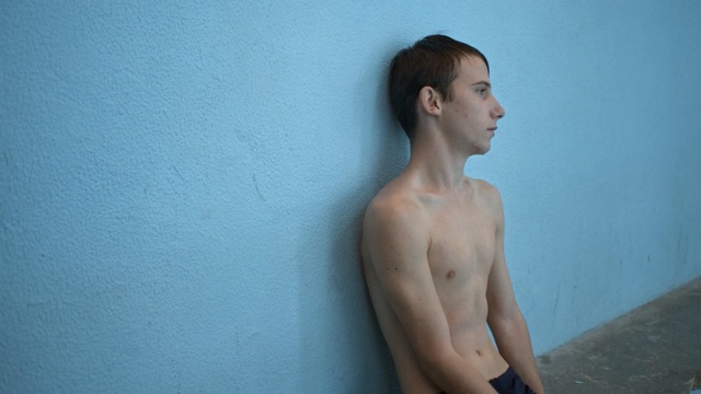 Video Reference: blue, barechestedness, shoulder, standing, male, neck, chest, muscle, back, arm, Person