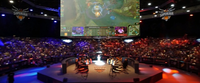 Video Reference: Stage, Auditorium, Theatre, Music venue, Convention, Sport venue, Audience, Performing arts center, Event, Display device, Person