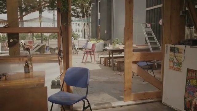 Video Reference: property, real estate, window, furniture, outdoor structure, floor, table, chair, Person