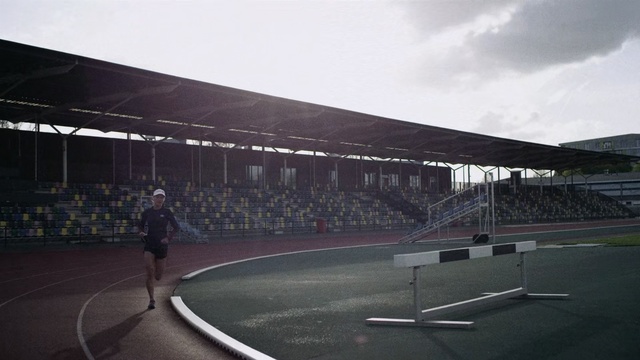 Video Reference: Sky, Sport venue, Cloud, Race track, Atmosphere, Architecture, Track and field athletics, Running, Recreation, Stadium