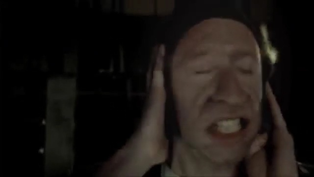 Video Reference: Face, Black, Nose, Facial expression, Head, Darkness, Eyebrow, Cheek, Forehead, Portrait, Person