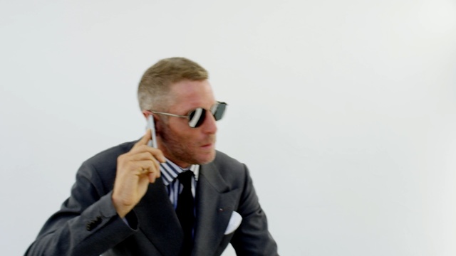 Video Reference: microphone, eyewear, vision care, businessperson, gentleman, suit, audio equipment