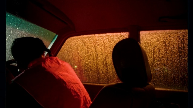 Video Reference: Red, Light, Mode of transport, Driving, Lighting, Night, Rear-view mirror, Sky, Automotive design, Automotive mirror