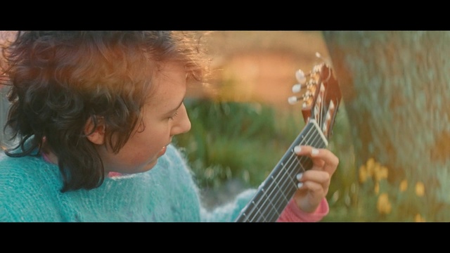 Video Reference: Skin, Nose, Ear, Musical instrument, String instrument, Photography, Music, Child, Happy, Smile