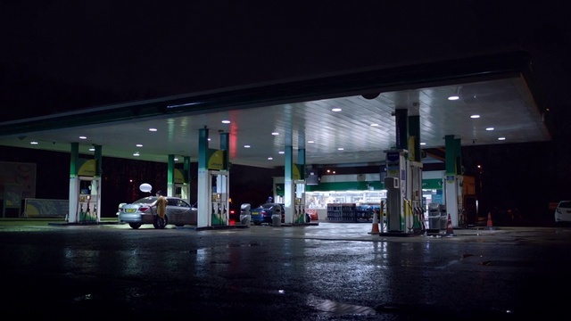Video Reference: Night, Building, Filling station, Metropolitan area, Architecture, Darkness, City, Gasoline, Midnight, Business