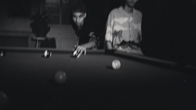 Video Reference: Billiards, Pool, Billiard table, Indoor games and sports, Billiard ball, Snooker, Billiard room, Games, Pocket billiards, Ball, Person, Equipment, Room, Indoor, Dark, Man, Sitting, Table, Front, Photo, Black, Holding, Lit, Woman, Standing, Young, Light, Computer, Cat, Playing, White, Board, Player, Bed, Riding, Pool table, Pool ball, Blackball (pool), Straight pool, Sports equipment, English billiards, Poolroom, Recreation room, Nine-ball, Baize, Cue stick, Pool player, Eight-ball, Trick shot, Black and white, Gambling, Music, Tabletop game, Poker, Poker table, Casino, Board game