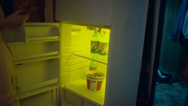 Video Reference: yellow, room, light, lighting, glass, product, house, shelf, refrigerator, furniture, Person