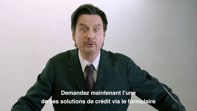 Video Reference: Suit, White-collar worker, Chin, Formal wear, Spokesperson, Forehead, Standing, Sitting, Tie, Businessperson