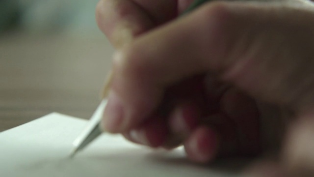 Video Reference: Finger, Hand, Writing instrument accessory, Nail, Writing, Thumb