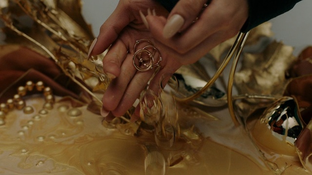 Video Reference: nail, finger, hand, jewellery, gold, Person