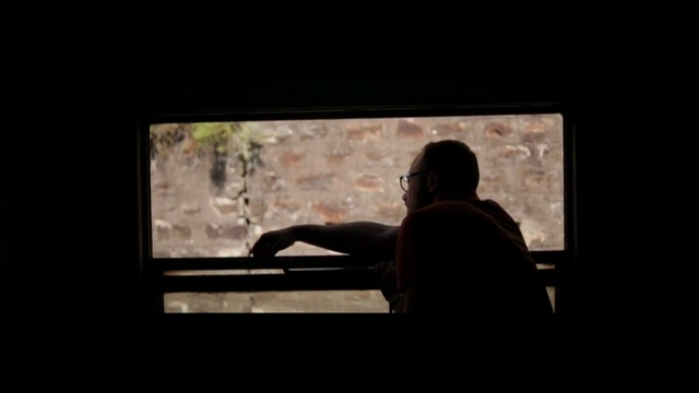 Video Reference: Black, Photograph, Shadow, Snapshot, Photography, Human, Visual arts, Darkness, Sitting, Room