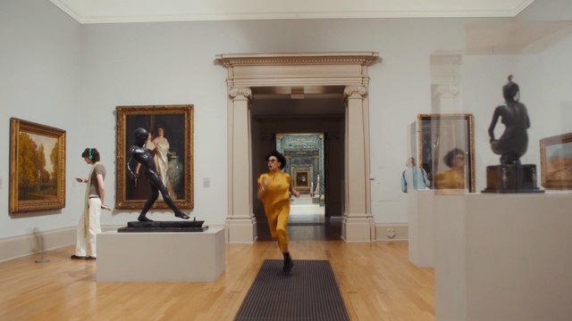 Video Reference: tourist attraction, museum, art gallery, exhibition, art, art exhibition, collection, modern art, interior design, art dealer, Person