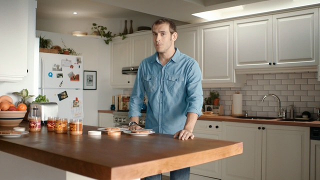 Video Reference: countertop, kitchen, room, cook, furniture, service, interior design, table, food, cuisine, Person