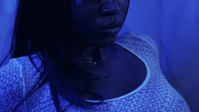 Video Reference: Blue, Face, Purple, Light, Cobalt blue, Skin, Electric blue, Lip, Nose, Neck