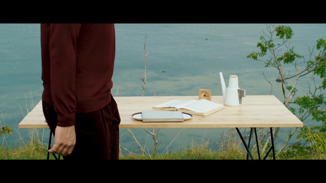 Video Reference: water, photograph, green, sitting, table, furniture, sky, vacation, photography, leisure, Person