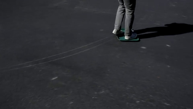 Video Reference: Asphalt, Skateboard, Skateboarding Equipment, Footwear, Road surface, Longboard, Sports equipment, Recreation, Leg, Shoe